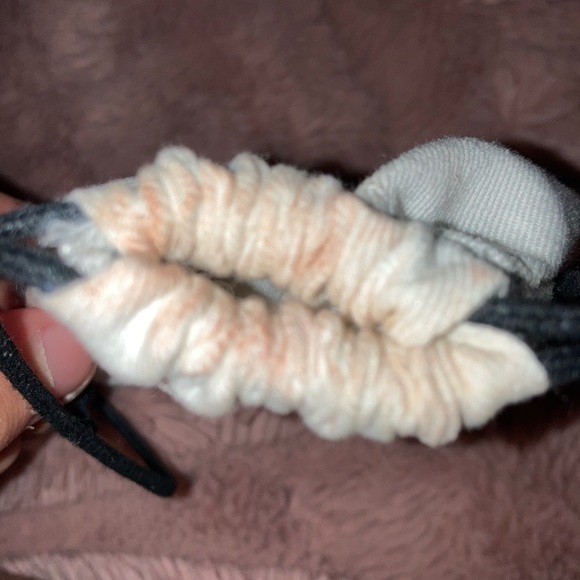 Coach stud earrings never worn with a bag that has a makeup spot on it. - Picture 3 of 3